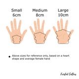 Two bears holding heart cookie cutter with stamp