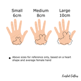 Easter  bunny holding carrot cookie cutter and stamp