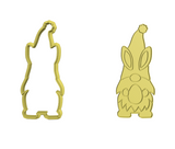 Easter Gnome holding egg cookie cutter and stamp