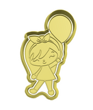 Little girl with  baloon cookie cutter and stamp